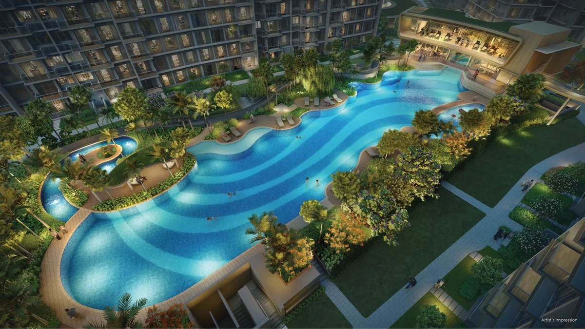 Grand Dunman central lagoon pool, hydro massage pool and Pool Clubhouse at dusk