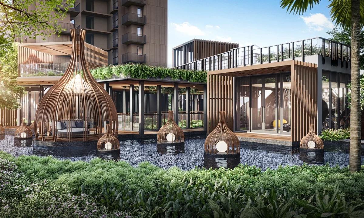 Kassia signature timber cocoon lounging pods and floating lanterns set over reflective tranquil water