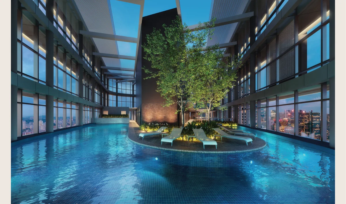 Level 34 Sky Pool at Newport Residences wrapping around lush landscaped island with double-height ceiling and panoramic skyline views