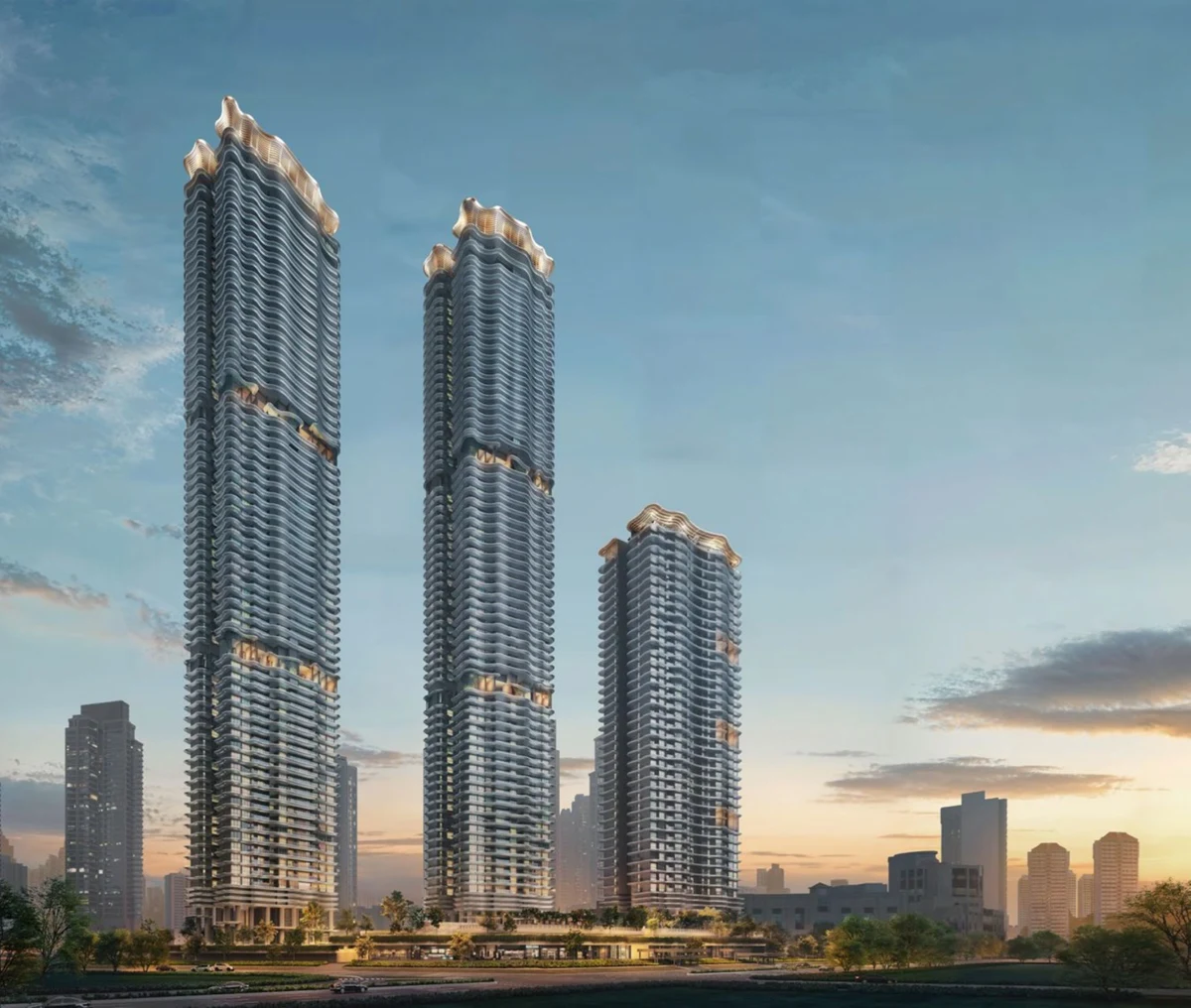 Zyon Grand full vertical exterior elevation of 62-storey towers at dusk